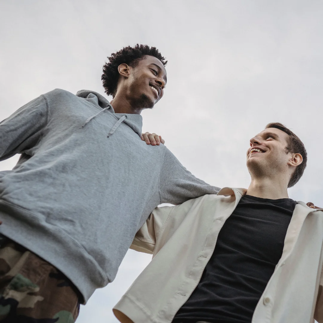 Two men showing support